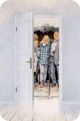 An open doorway showing Mark Pearson with family and friends.